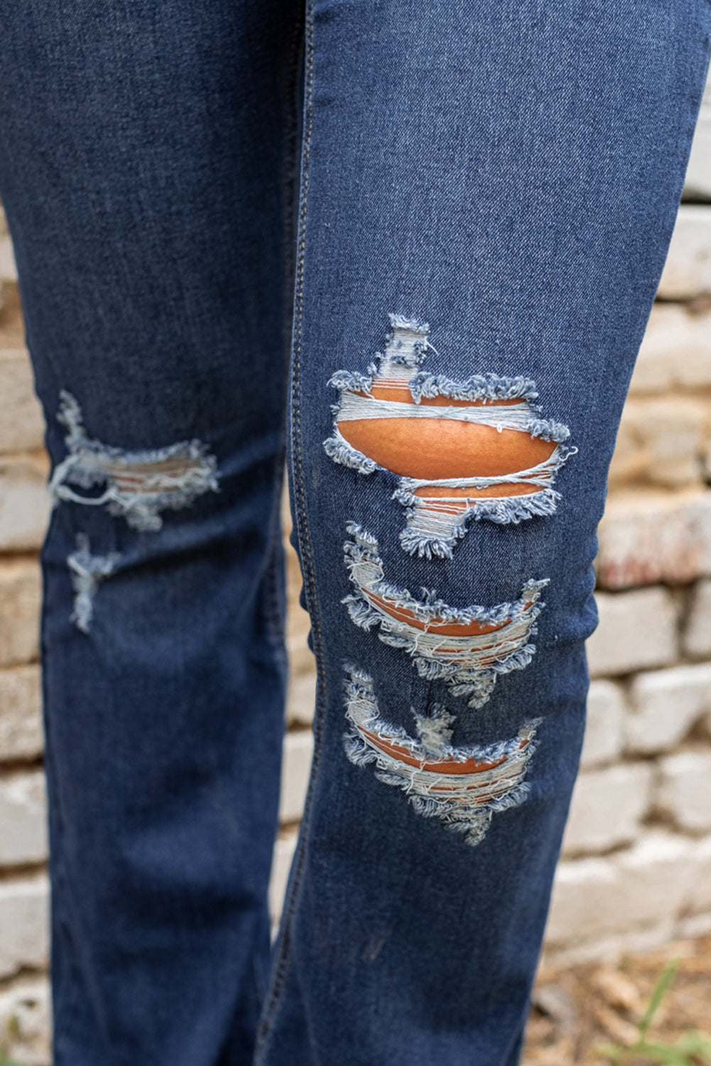 Women's Jeans with Distressed Flare Bottom Washed