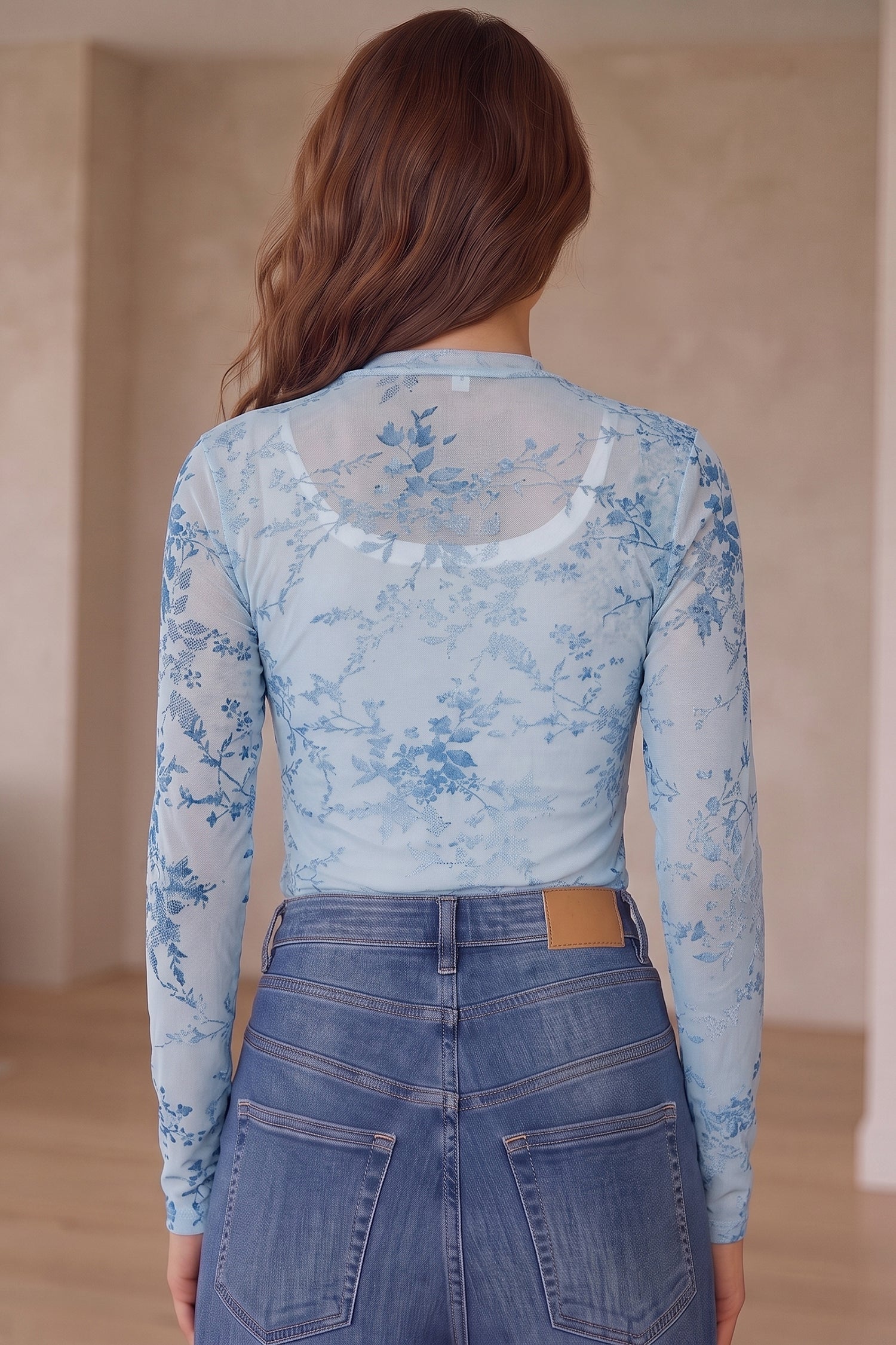 Sheer Printed Mesh Floral Mock-Neck Long-Sleeved Bodysuit in Sky Blue