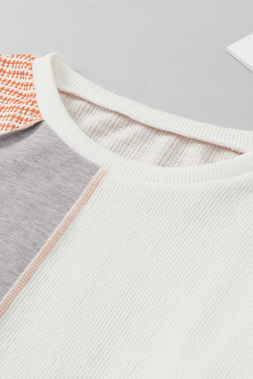 Exposed Seam Colorblock Oversized Knit Top