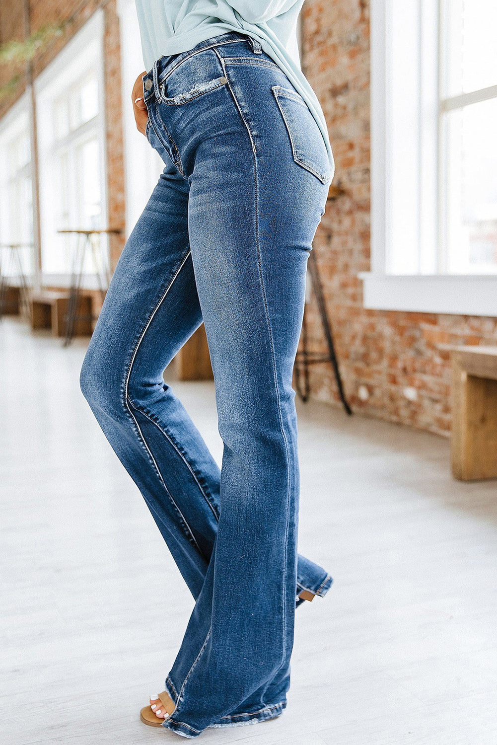 Women's High Rise Medium Wash Flare Jeans