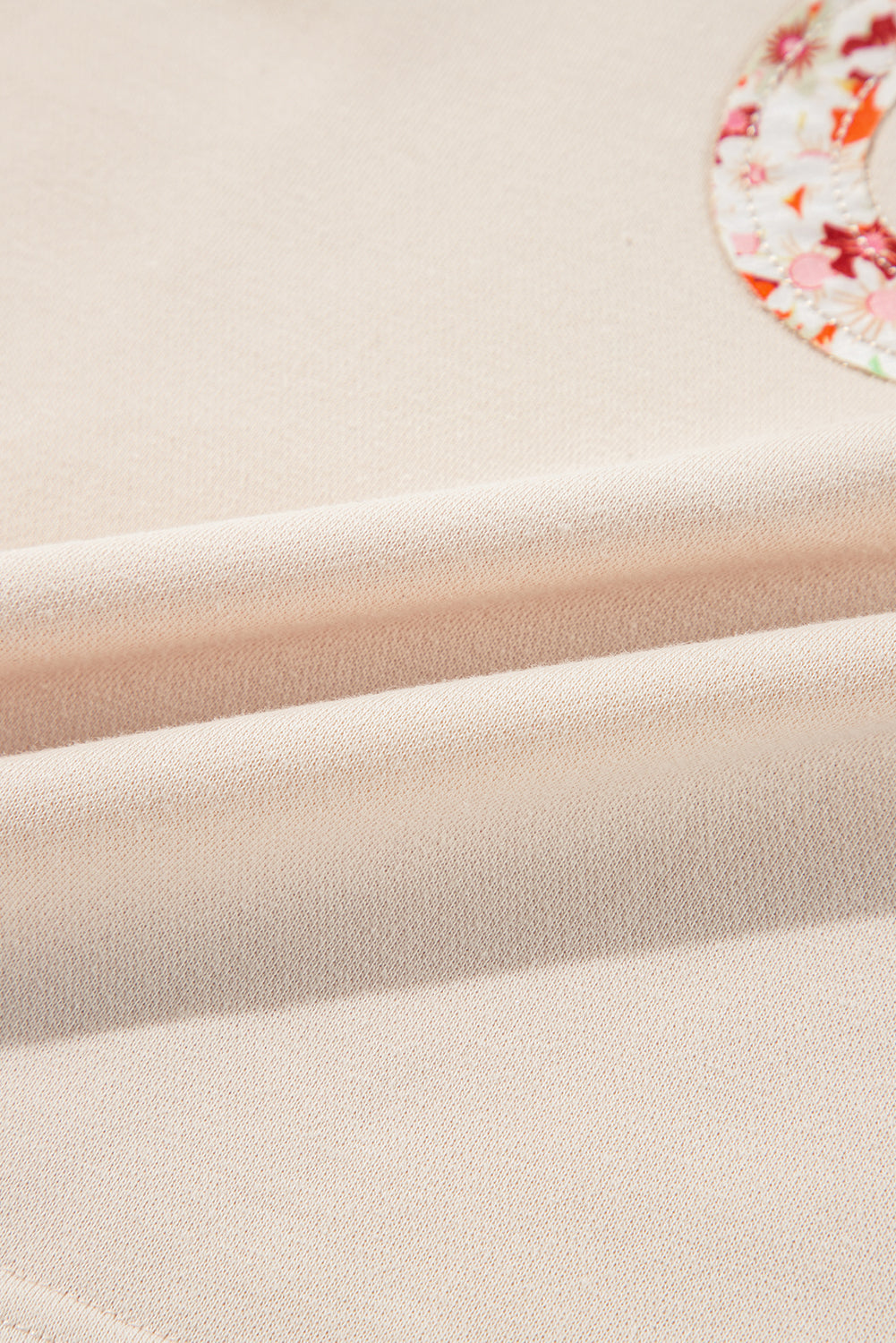 Flower Patch Graphic Exposed Seam Wide Sleeve Top