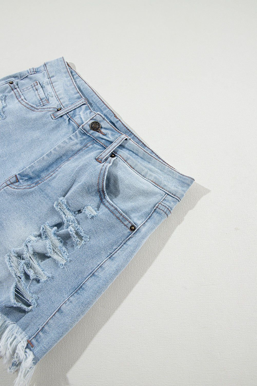 Raw Distressed Ripped Hem High-Waisted Denim Shorts in Light Blue