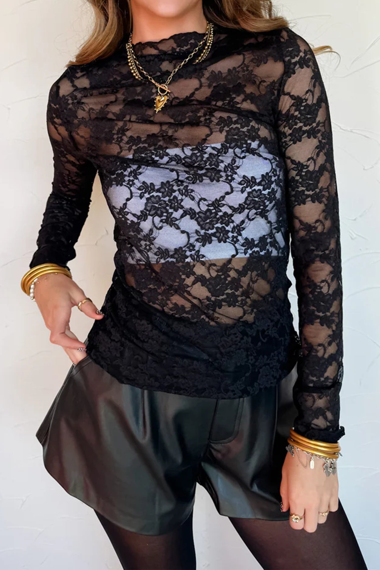 Lace Sheer Floral Lettuce Trim Mock-Neck Long-Sleeved Top in Black
