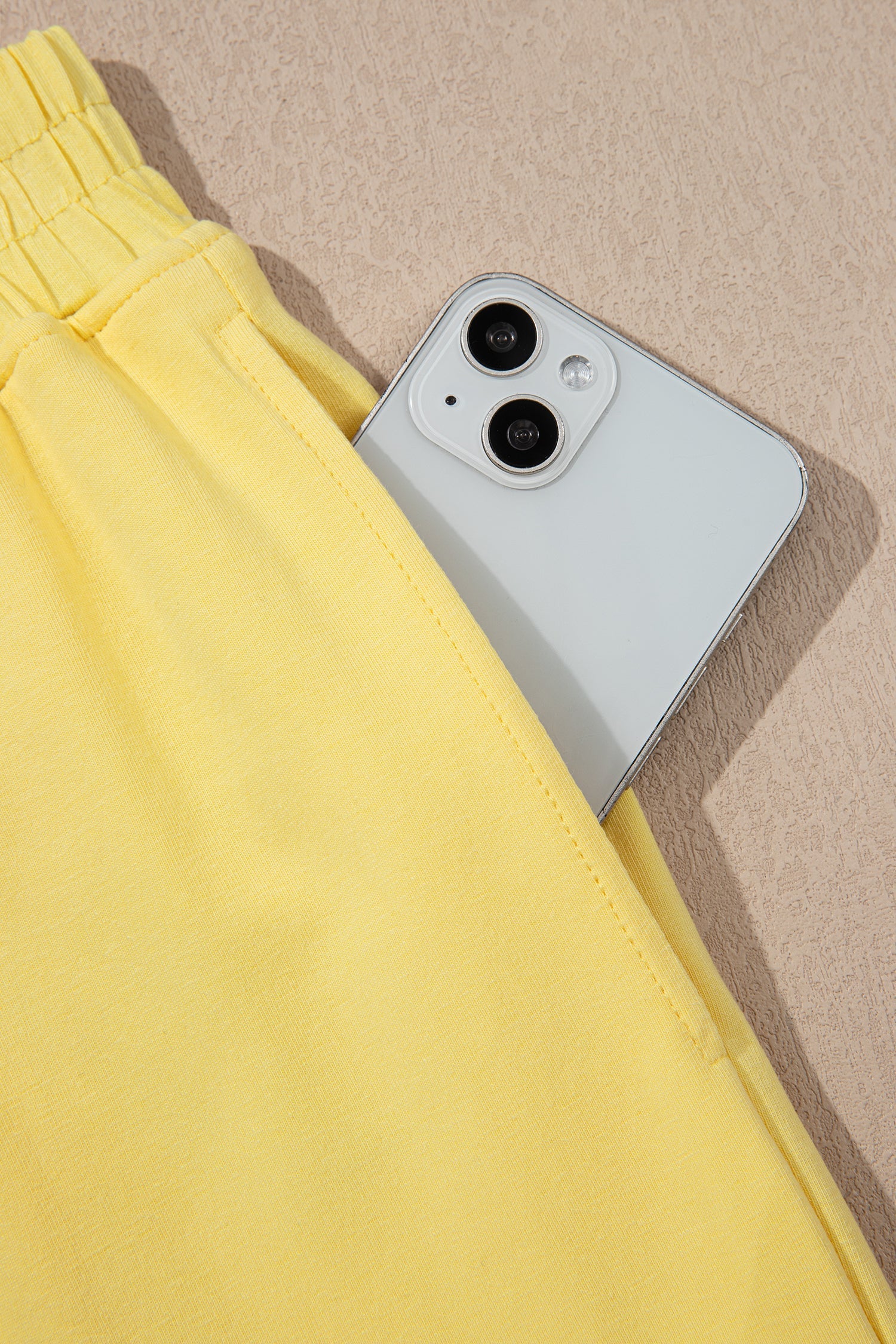 Solid Cropped Cream Cropped Tank Top and Jogger Pants Set in Yellow