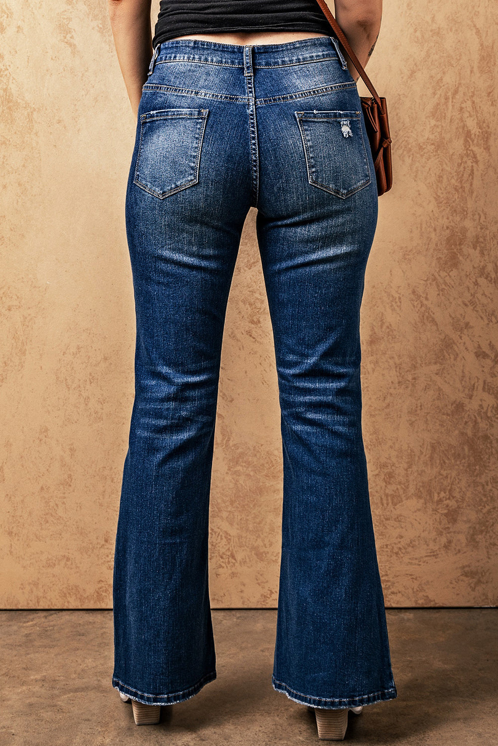 Women's High Rise Medium Wash Flare Jeans