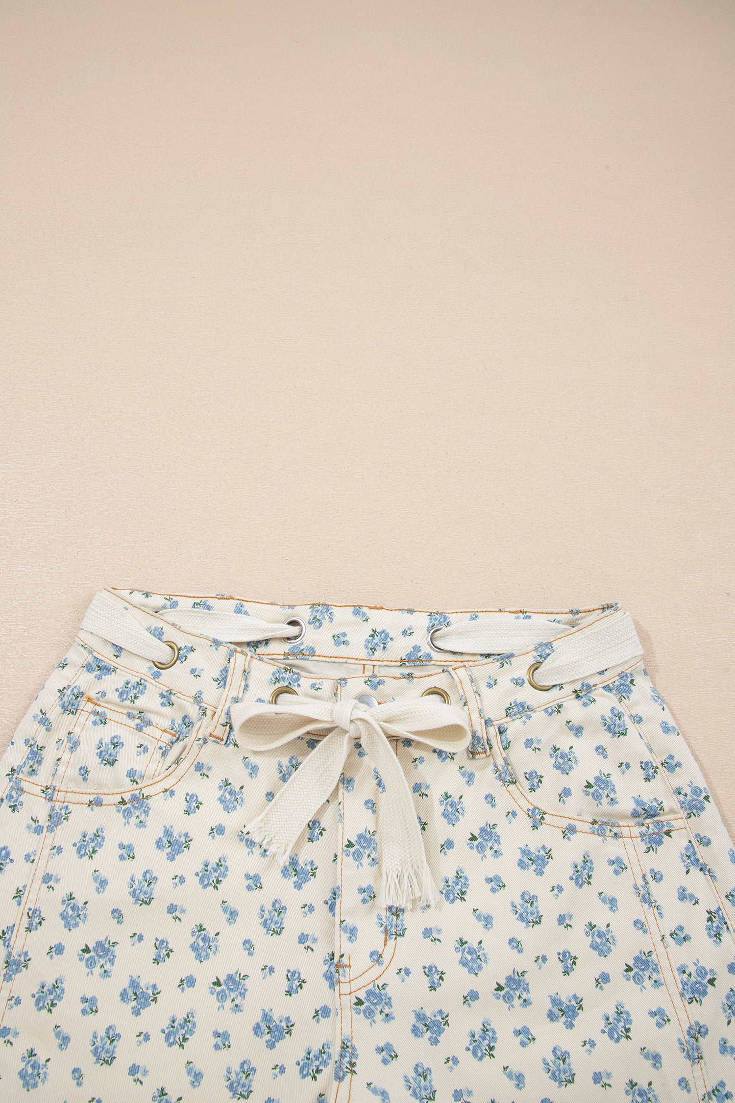 Grommet Knot Waist Floral Barrel Leg Jeans in Beige