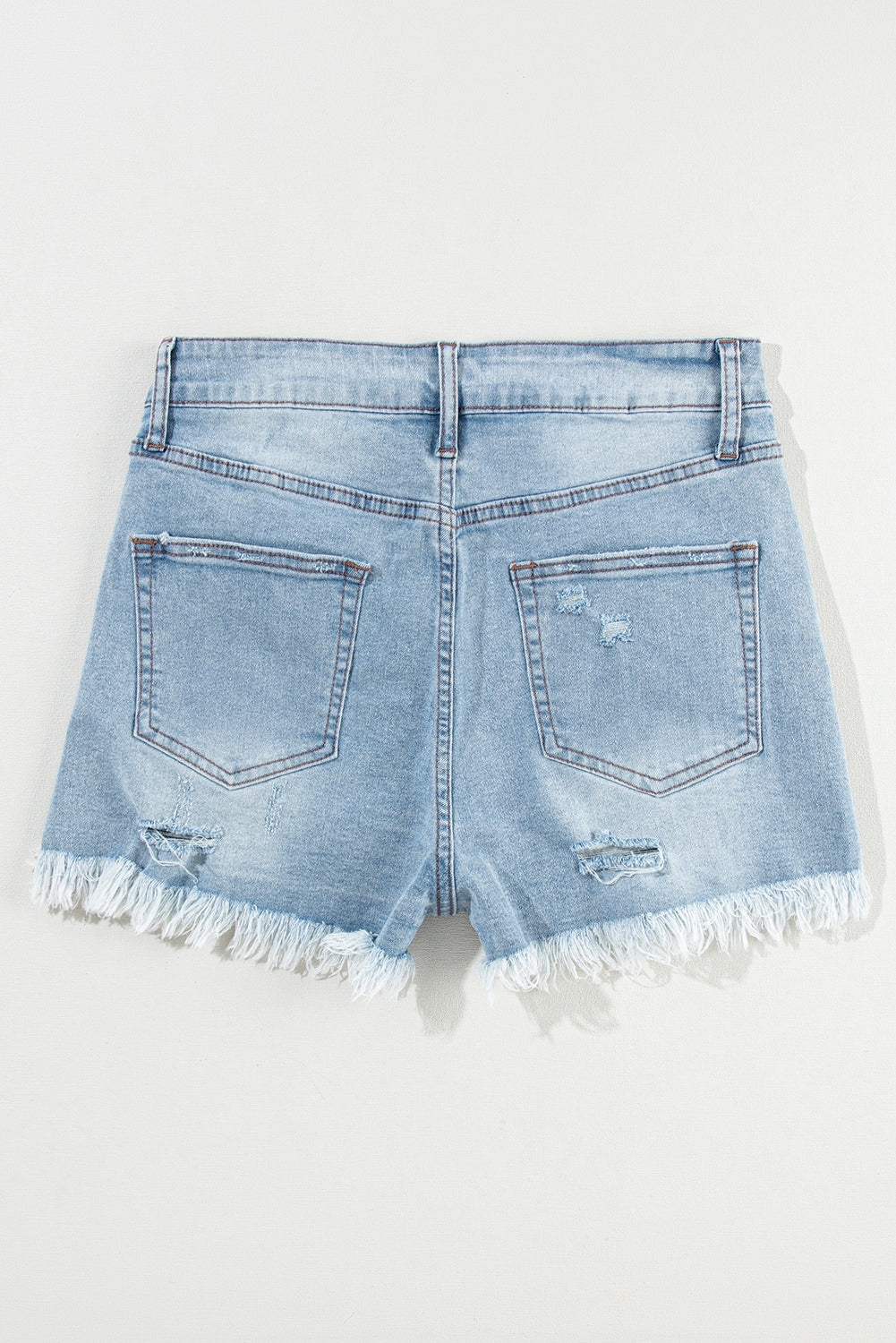 Raw Distressed Ripped Hem High-Waisted Denim Shorts in Light Blue