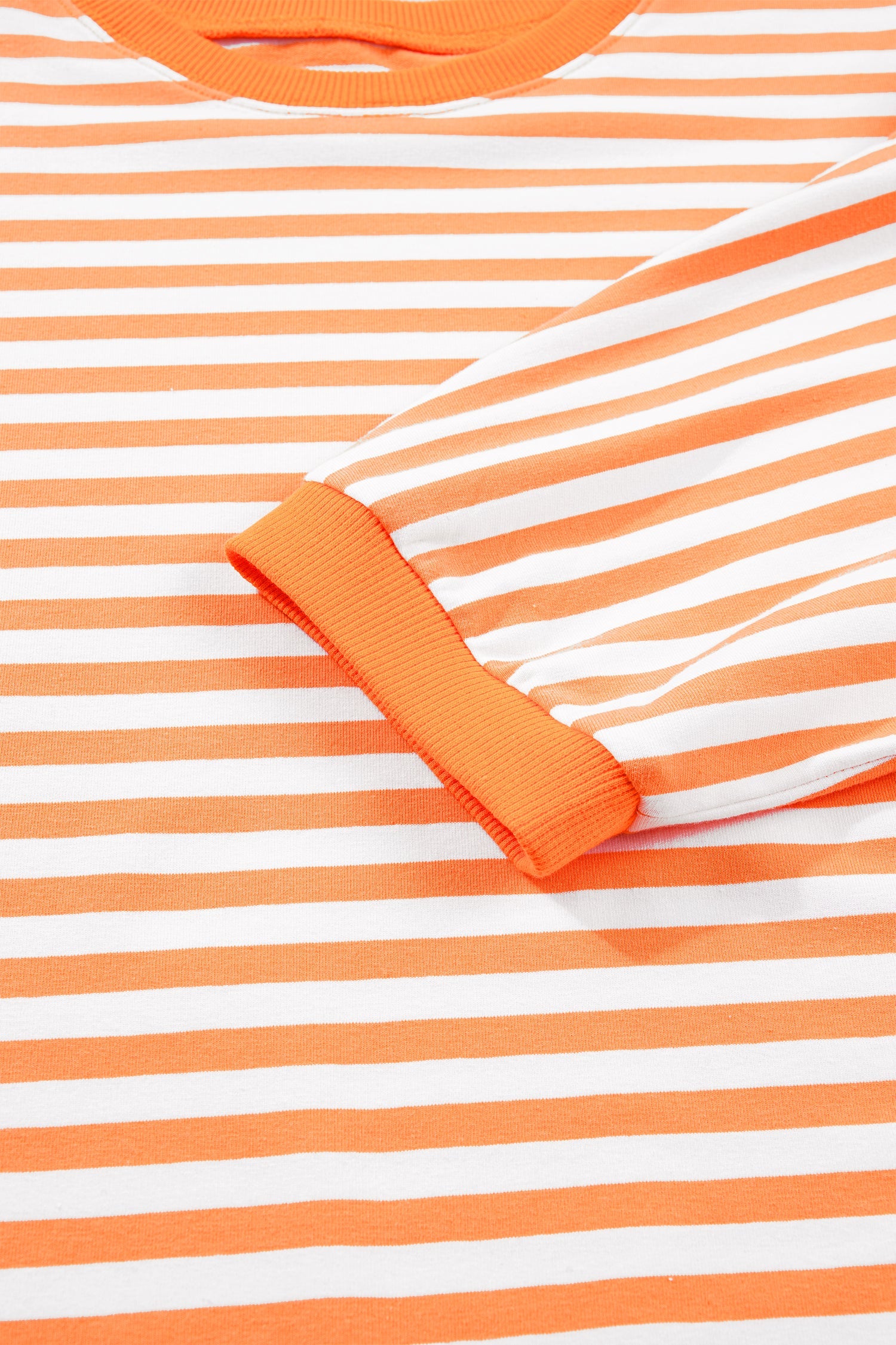 3/4 Sleeve Stripe Sleeve Exposed Seam Pullover Top in Orange