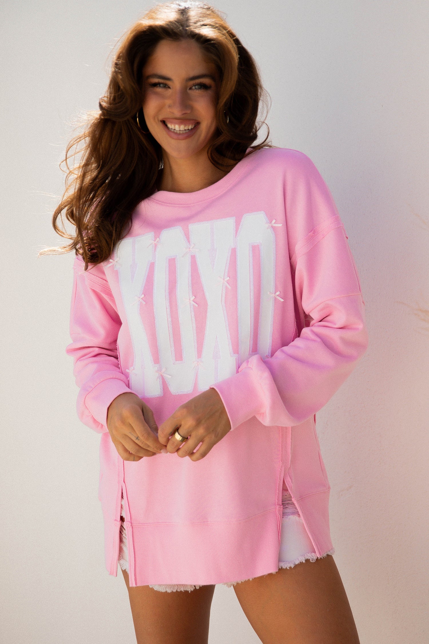 Bow Sequin XOXO Letter Graphic Exposed Seam Baggy Sweatshirt