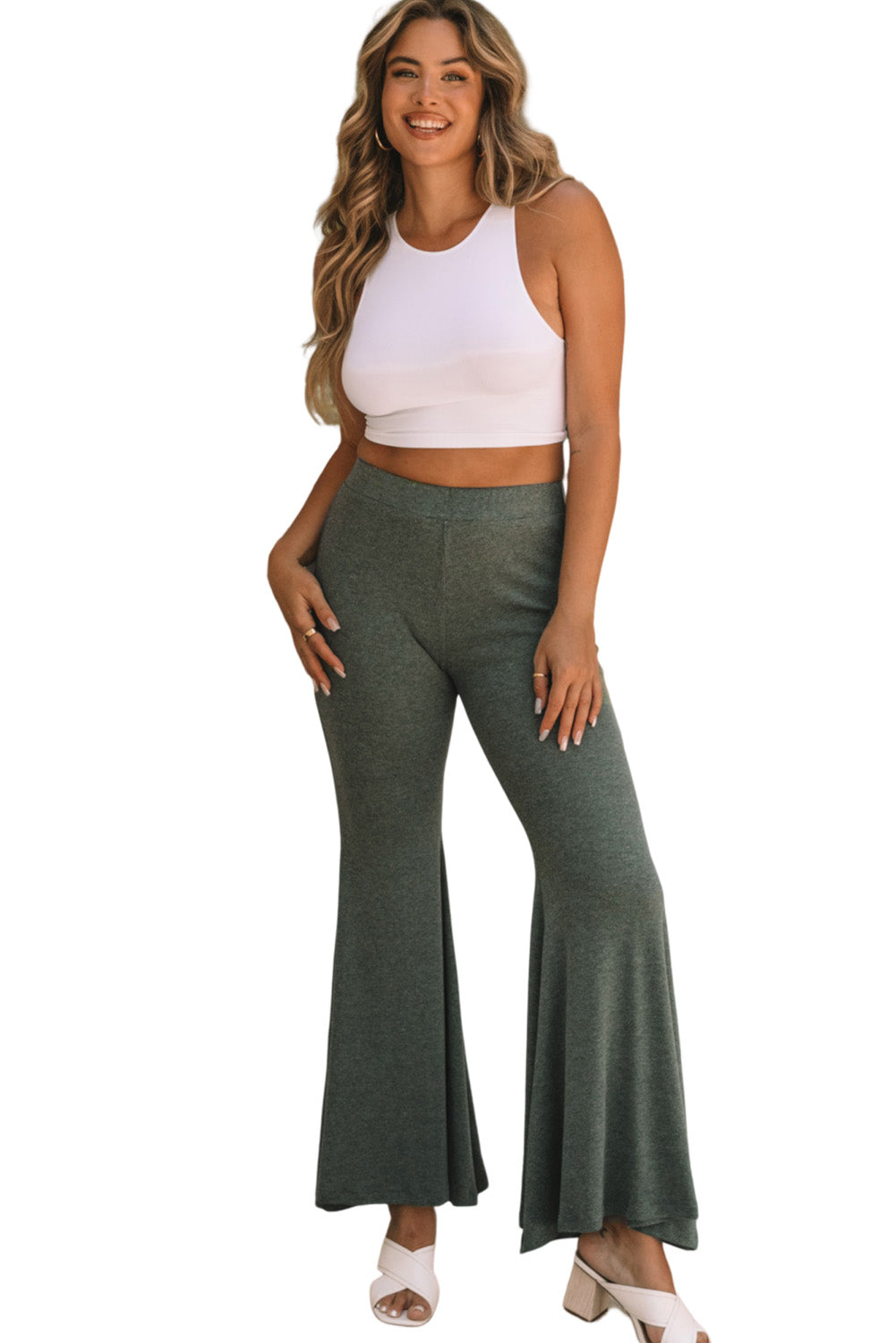 Pantalon vert taille haute ajusté et évasé