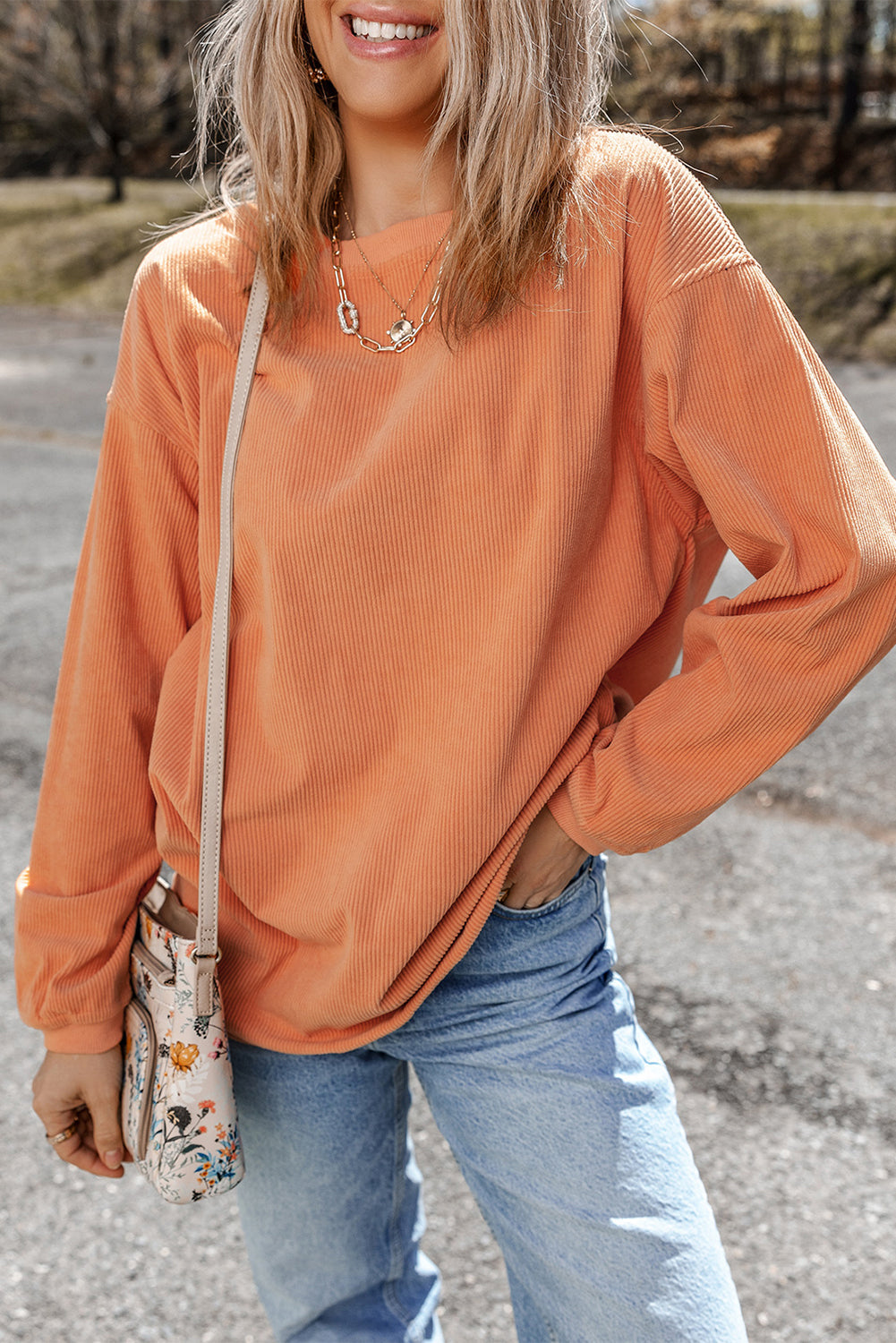 Sweat oversize orange en velours côtelé