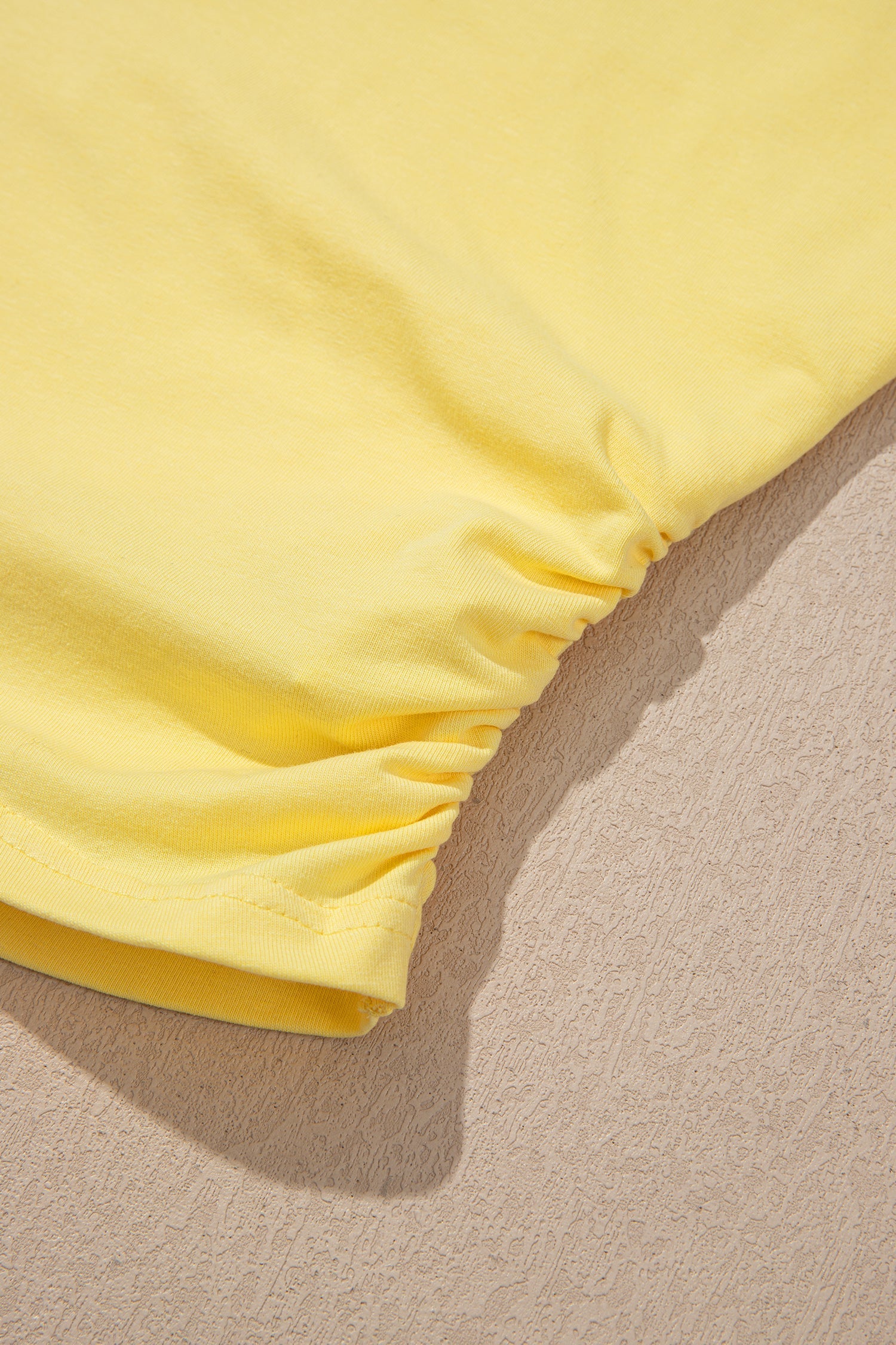Solid Cropped Cream Cropped Tank Top and Jogger Pants Set in Yellow