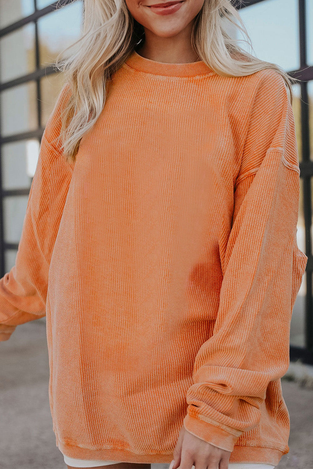 Sweat oversize orange en velours côtelé