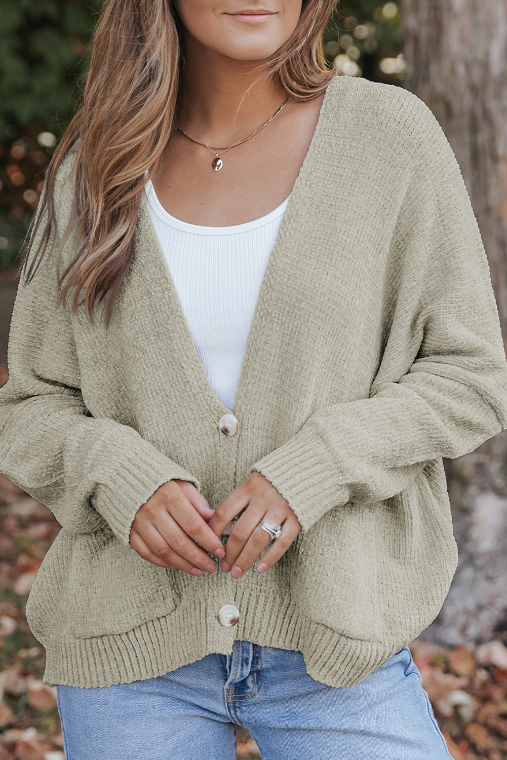 Cardigan pull avec poches sur le devant et boutons