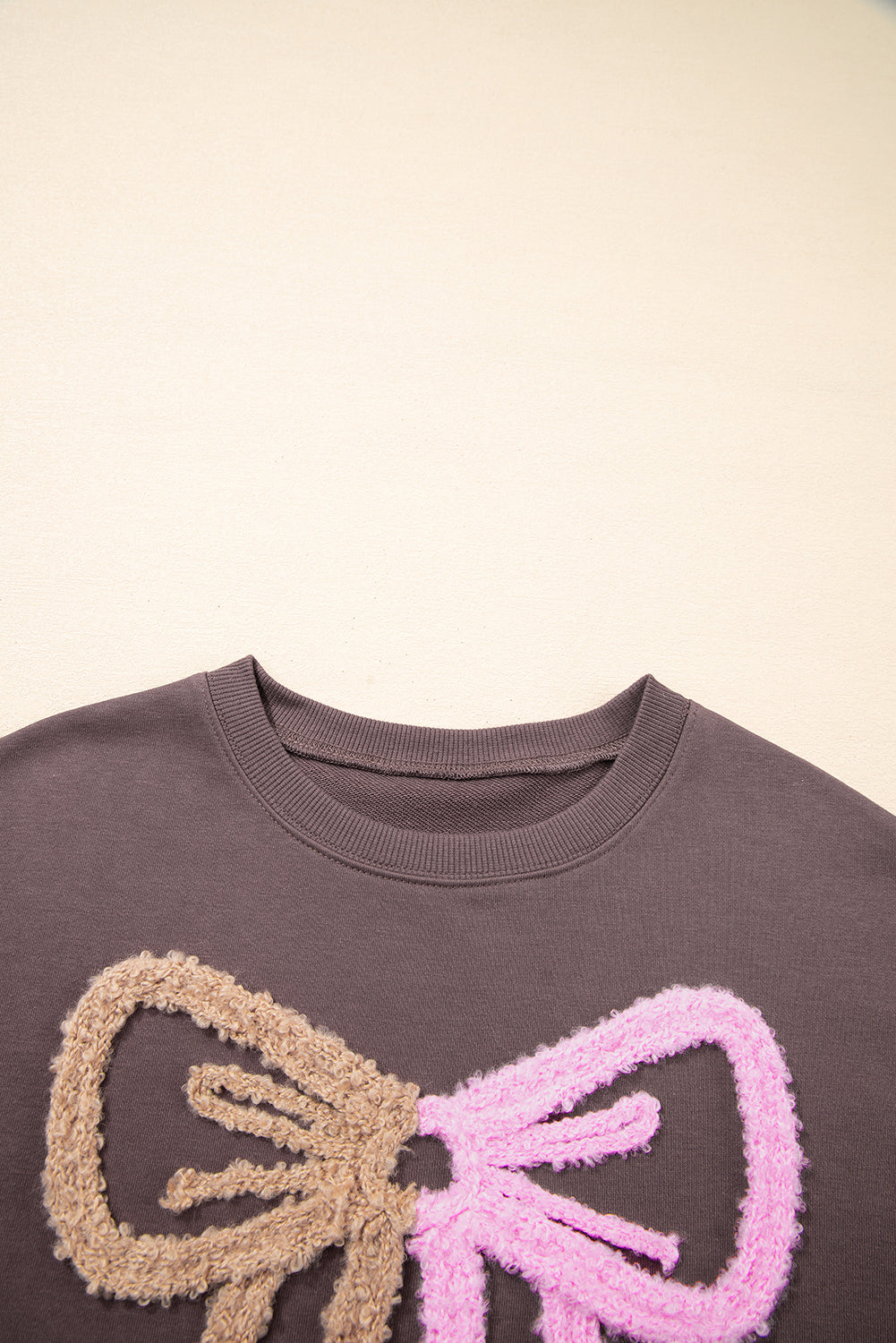 Terry Bow Contrast Bow Pattern Drop-Shoulder Sweatshirt