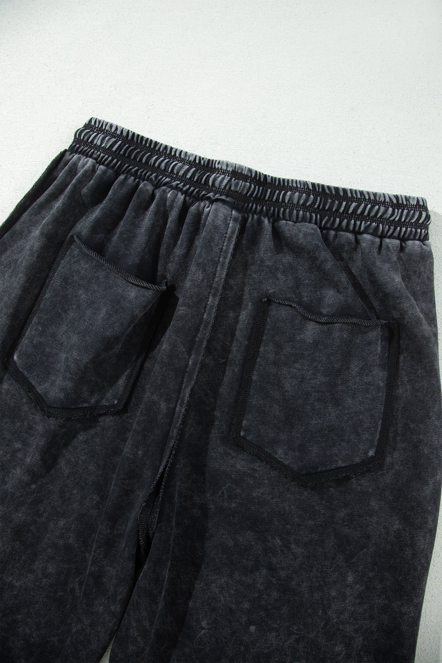 Raw Seam Drawcord Elastic Waist Barrel Pants in Black