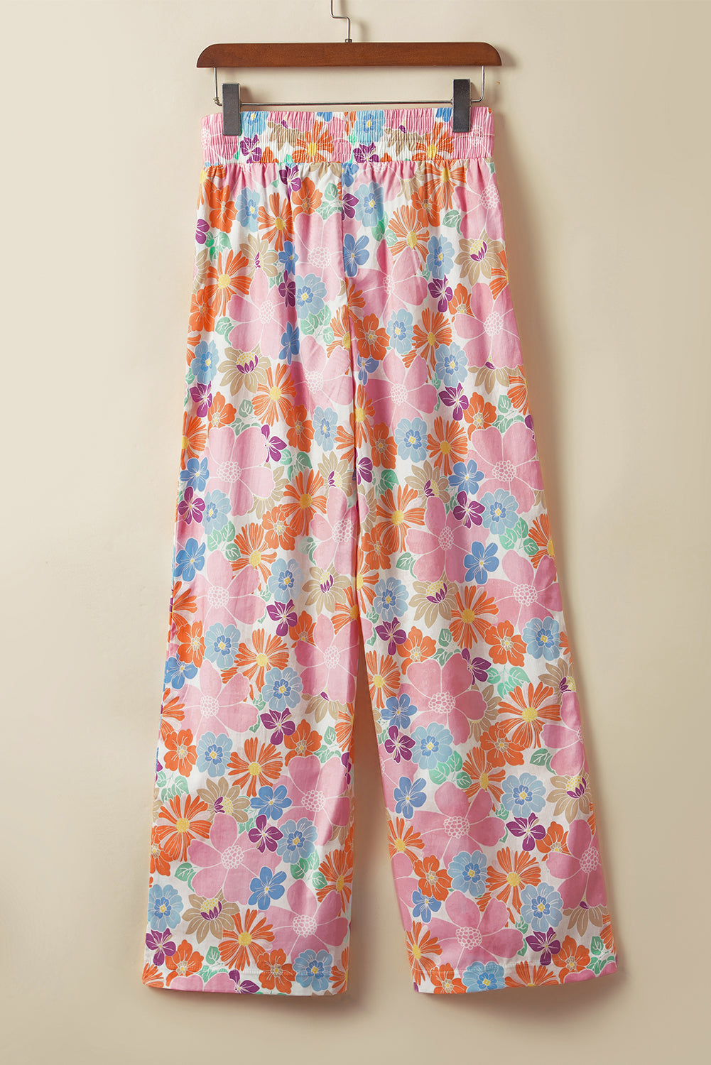 Pantalon ample fleuri à taille smockée