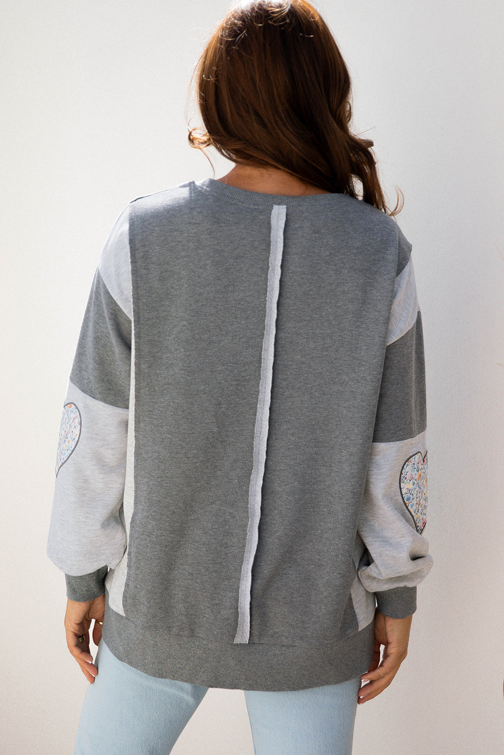 LOVE Graphic Exposed Seam Patchwork Uneven Hem Polished Sweatshirt