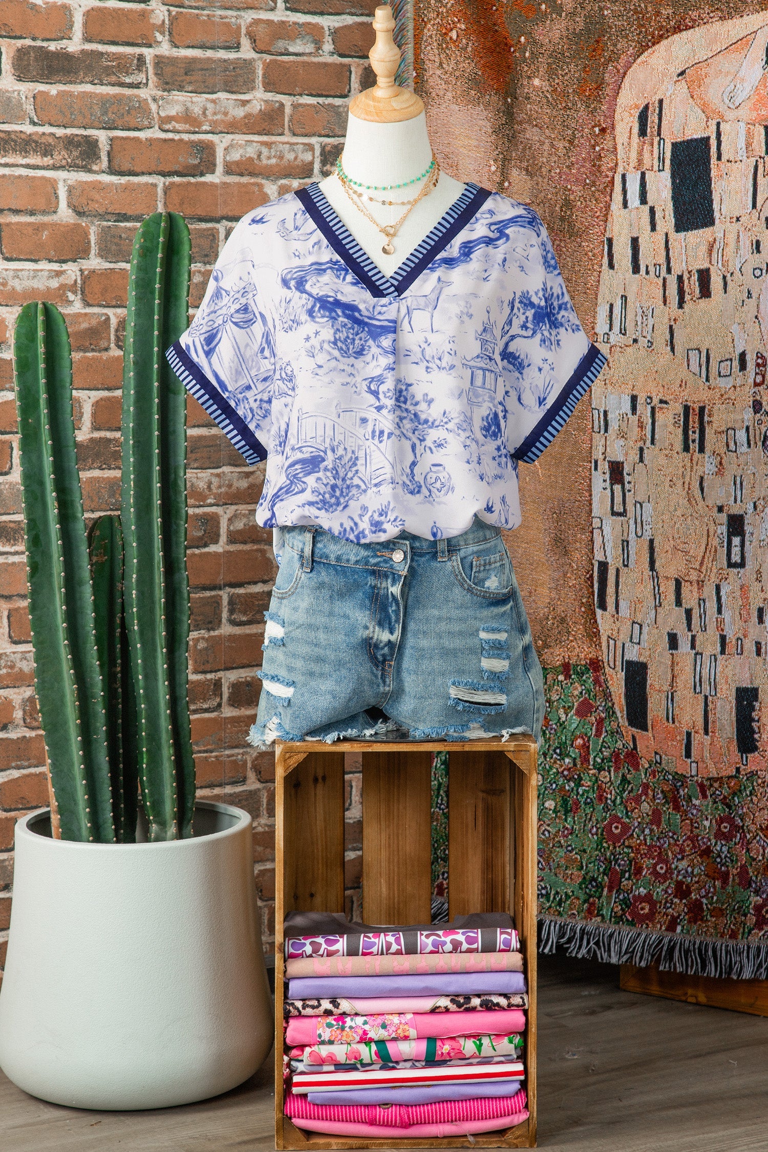 Animal Paradise Wild Paradise Striped Trim V-Neck Short-Sleeved Blouse in Blue