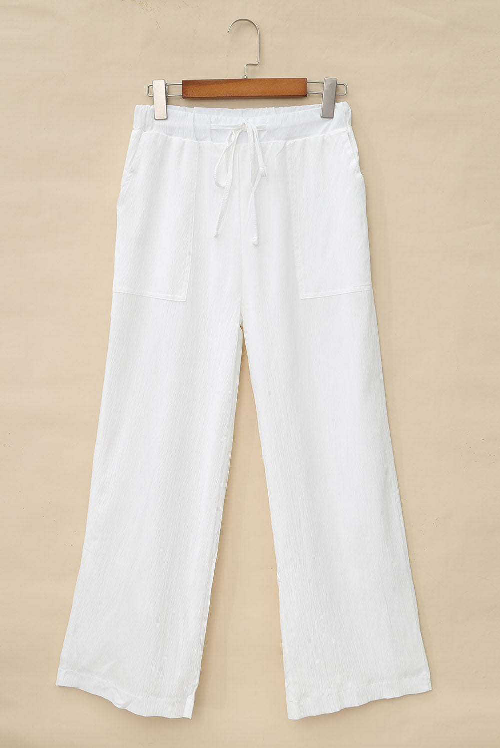 Pantalon large froissé blanc à taille avec cordon de serrage