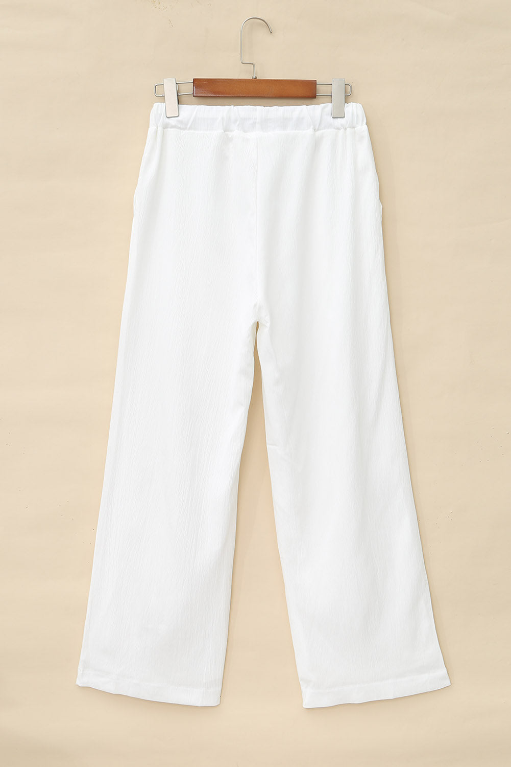 Pantalon large froissé blanc à taille avec cordon de serrage