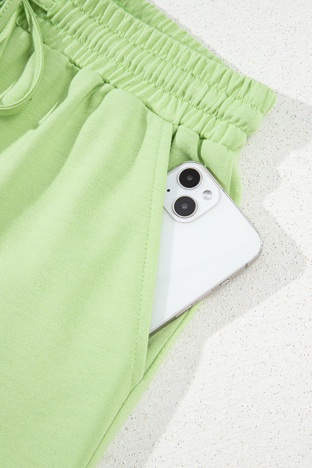 Meadow Mist Green Solid Loose V-Neck Half Sleeve Tee and Shorts