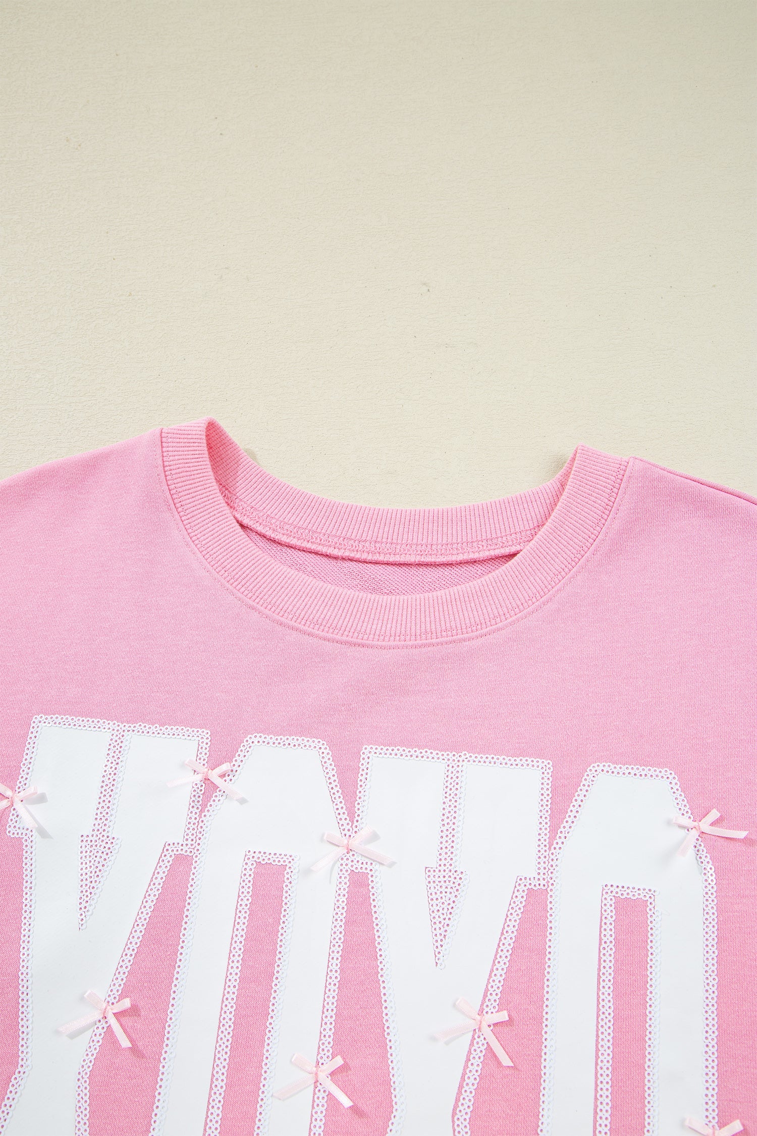 Bow Sequin XOXO Letter Graphic Exposed Seam Baggy Sweatshirt