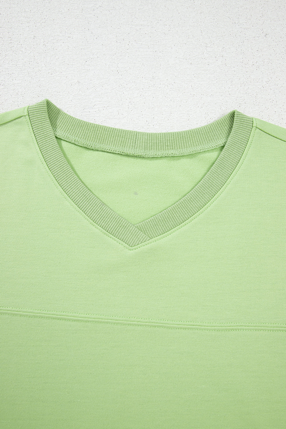 Meadow Mist Green Solid Loose V-Neck Half Sleeve Tee and Shorts