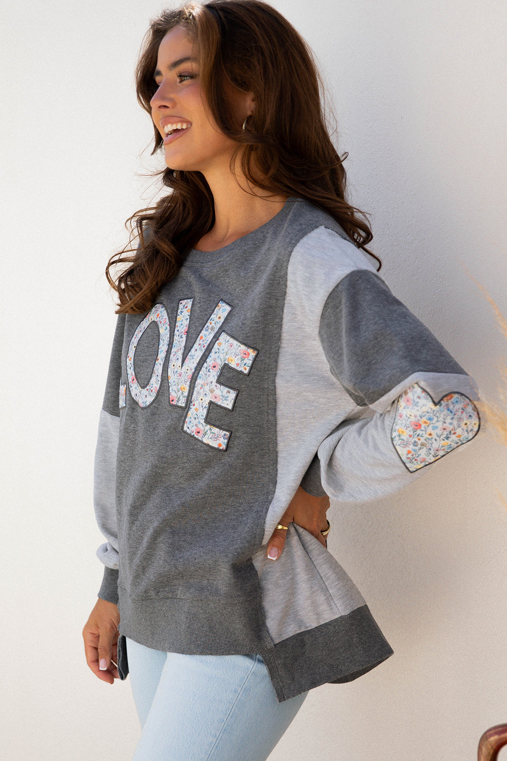 LOVE Graphic Exposed Seam Patchwork Uneven Hem Polished Sweatshirt