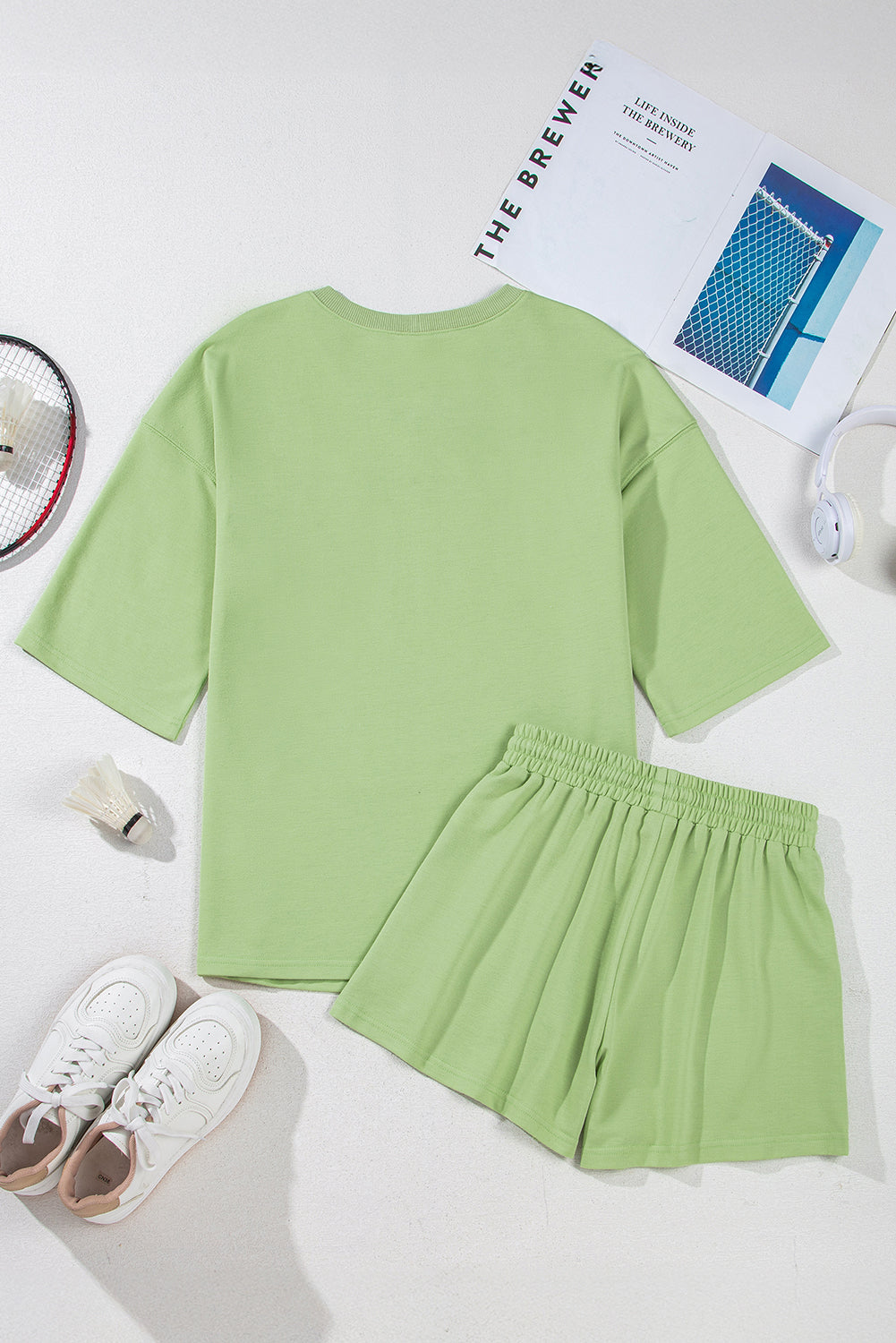 Meadow Mist Green Solid Loose V-Neck Half Sleeve Tee and Shorts