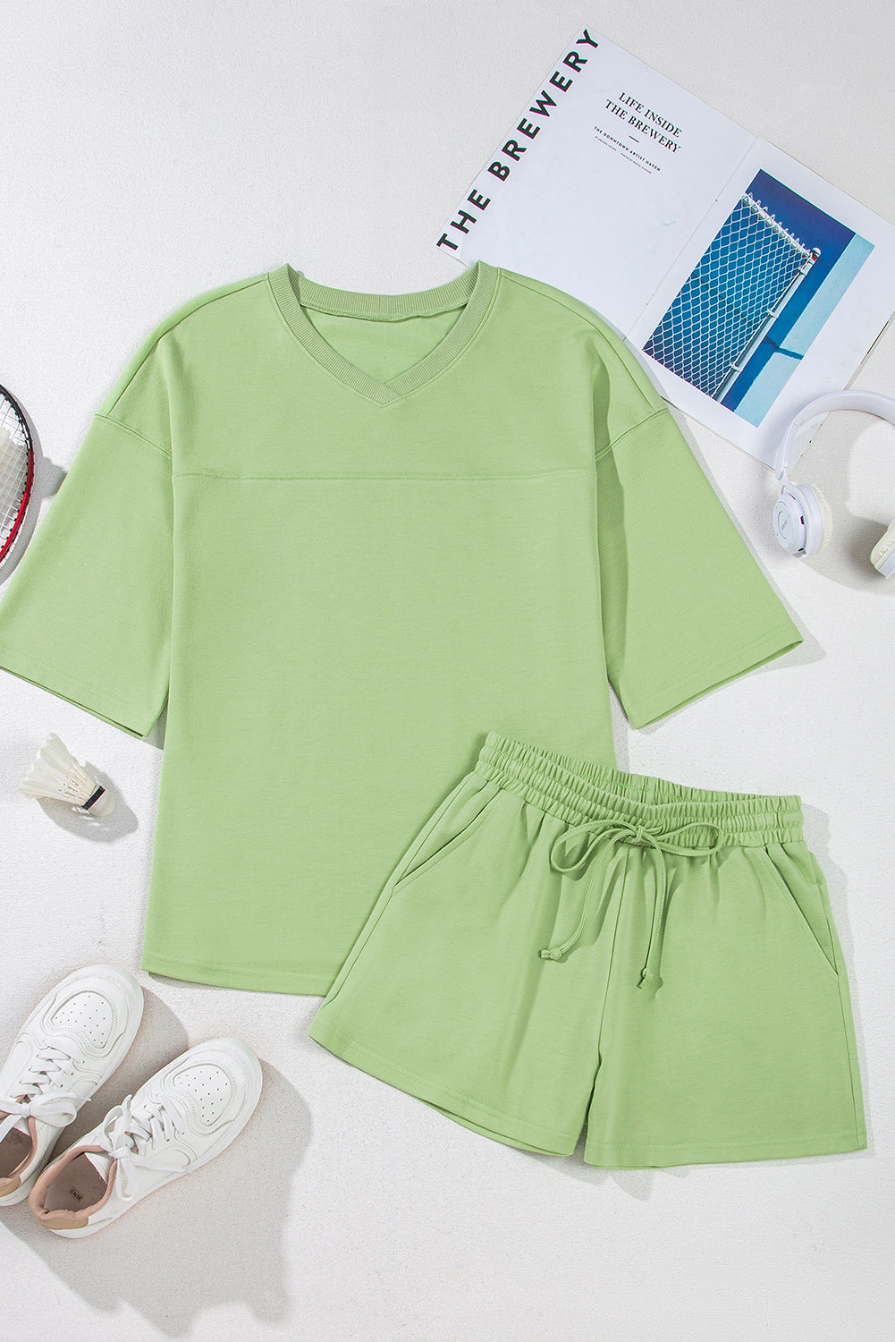 Meadow Mist Green Solid Loose V-Neck Half Sleeve Tee and Shorts