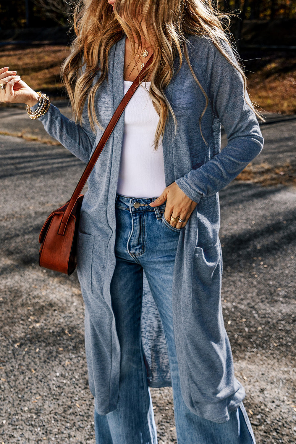 Cardigan long ouvert sur le devant avec poches en tricot flammé bleu