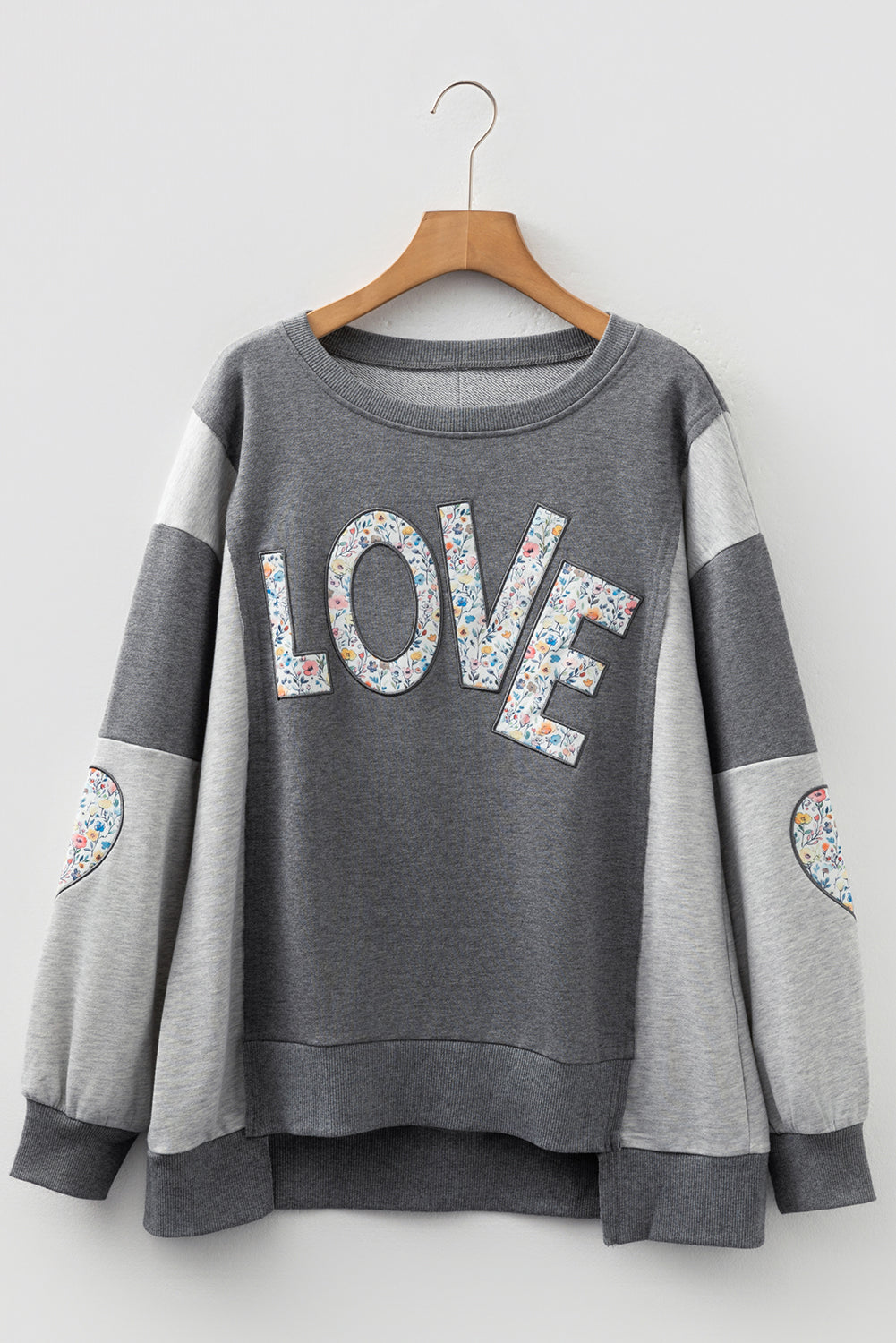 LOVE Graphic Exposed Seam Patchwork Uneven Hem Polished Sweatshirt