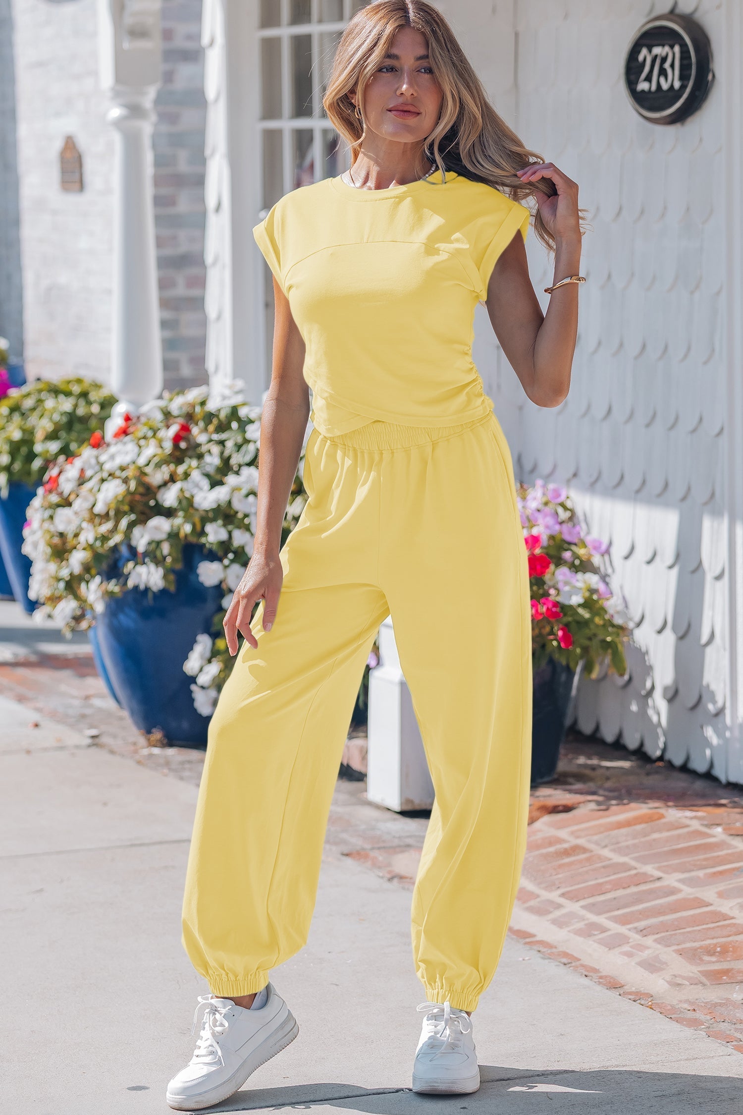 Solid Cropped Cream Cropped Tank Top and Jogger Pants Set in Yellow