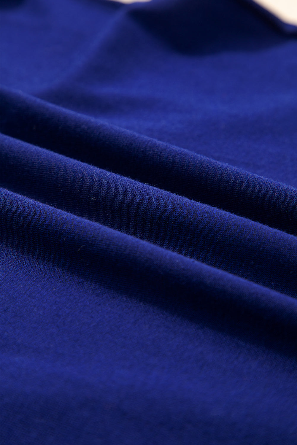 Detail Asymmetric Seam Solid Long-Sleeved Top