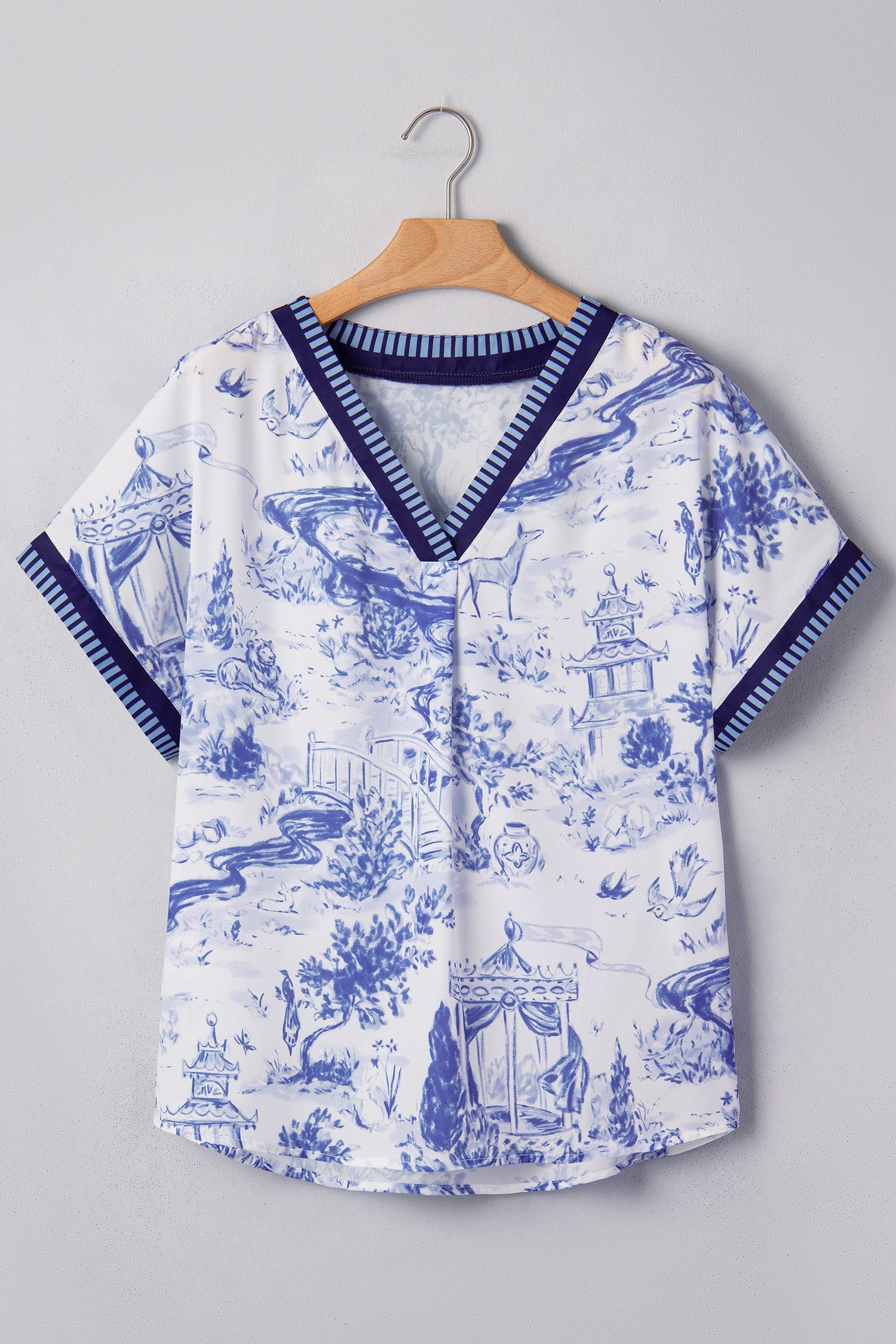 Animal Paradise Wild Paradise Striped Trim V-Neck Short-Sleeved Blouse in Blue