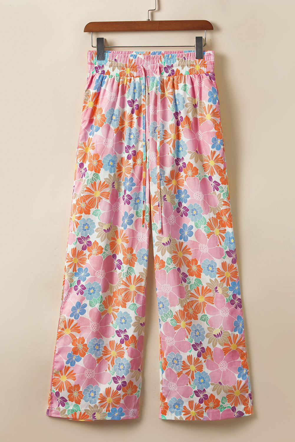 Pantalon ample fleuri à taille smockée