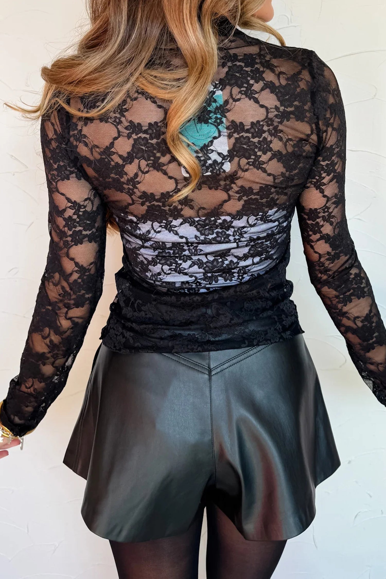 Lace Sheer Floral Lettuce Trim Mock-Neck Long-Sleeved Top in Black