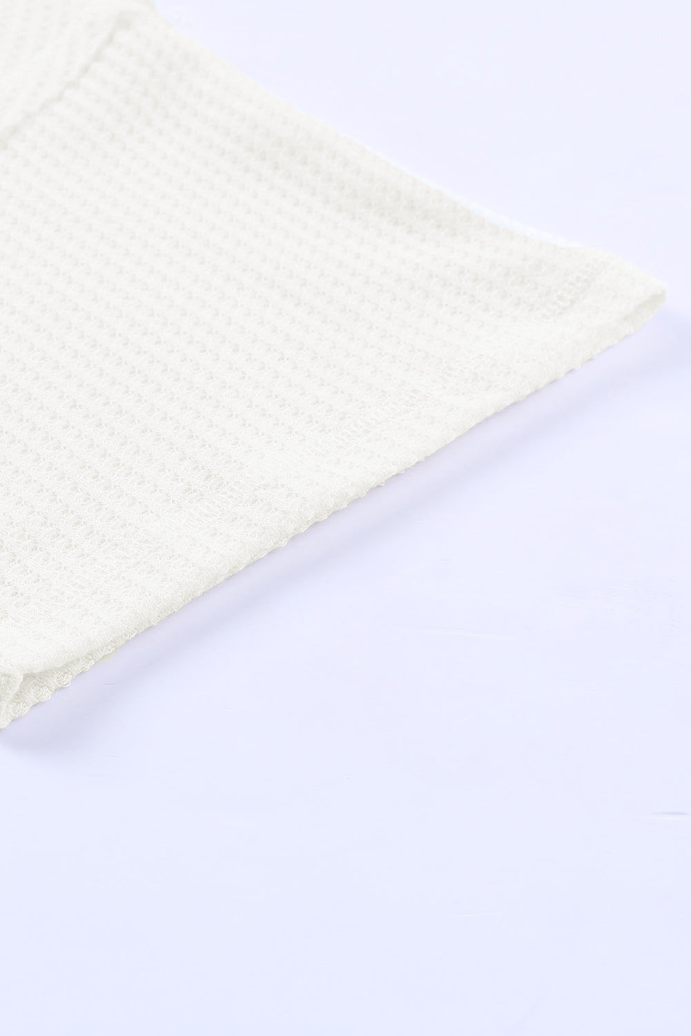 Haut ample blanc en tricot gaufré à épaules tombantes